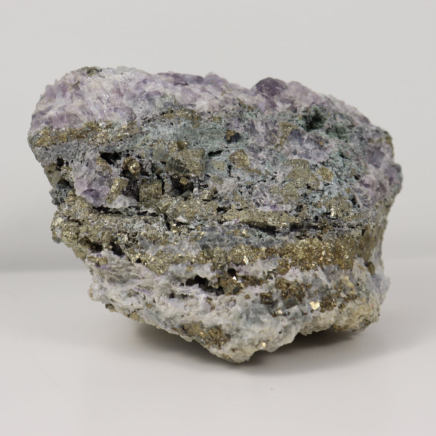 Pyrite Specimen with Clear Quartz and Amethyst Inclusions