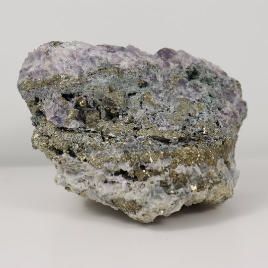 Pyrite Specimen with Clear Quartz and Amethyst Inclusions
