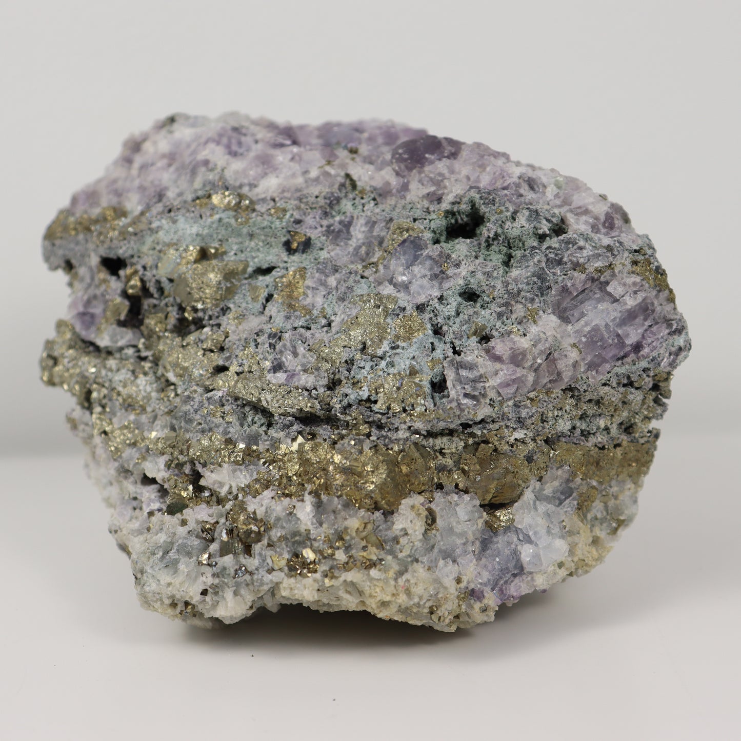 Pyrite Specimen with Clear Quartz and Amethyst Inclusions