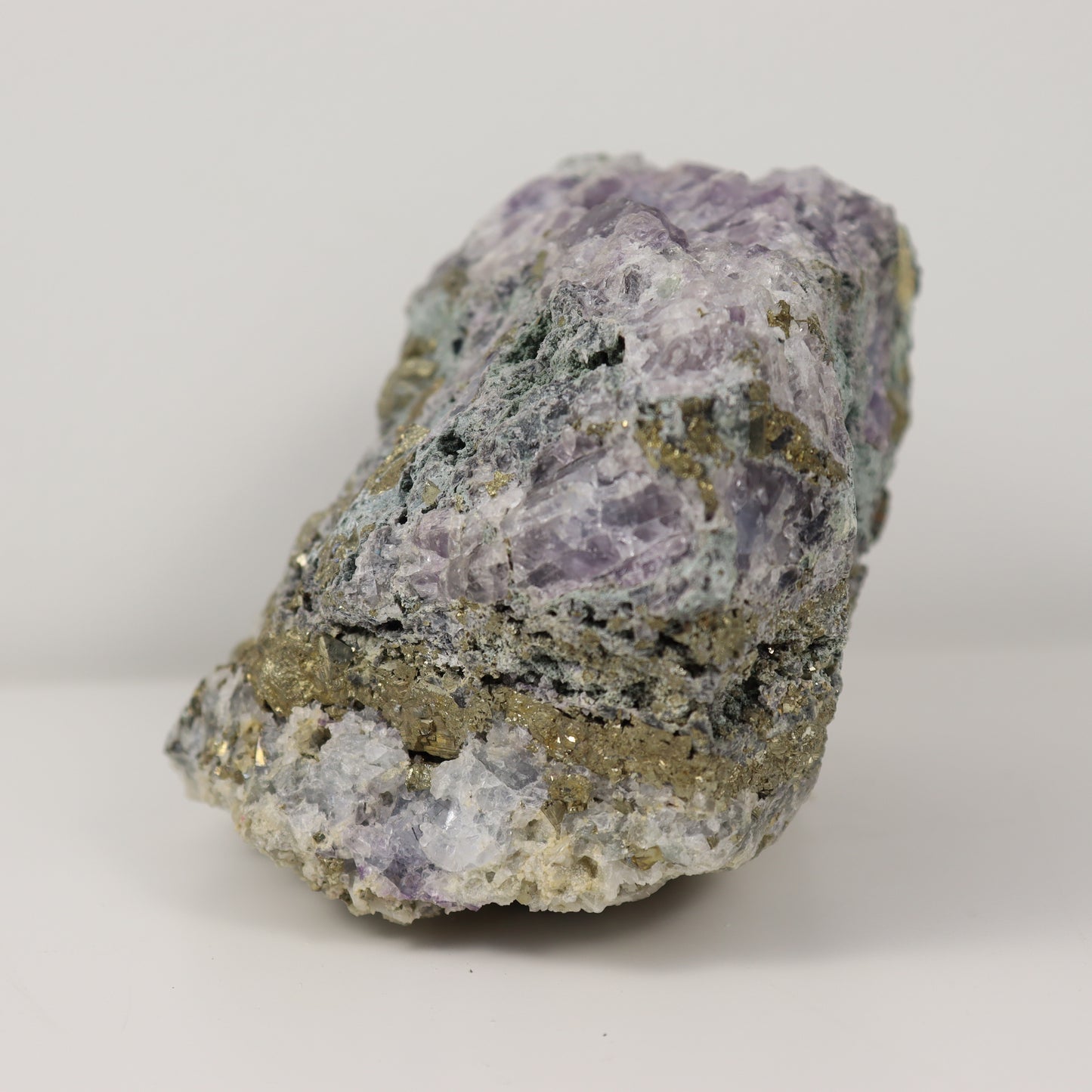 Pyrite Specimen with Clear Quartz and Amethyst Inclusions