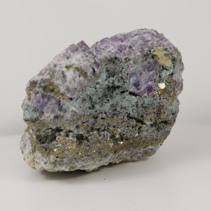 Pyrite Specimen with Clear Quartz and Amethyst Inclusions