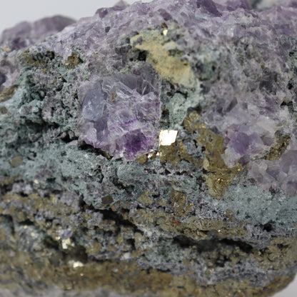 Pyrite Specimen with Clear Quartz and Amethyst Inclusions