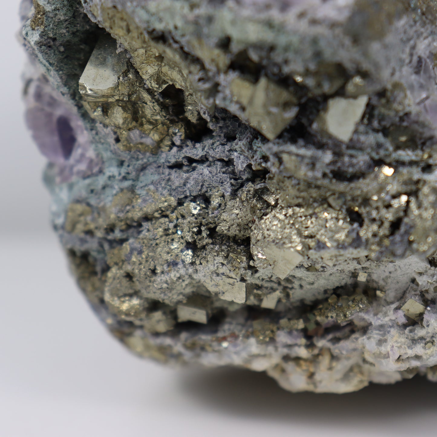 Pyrite Specimen with Clear Quartz and Amethyst Inclusions