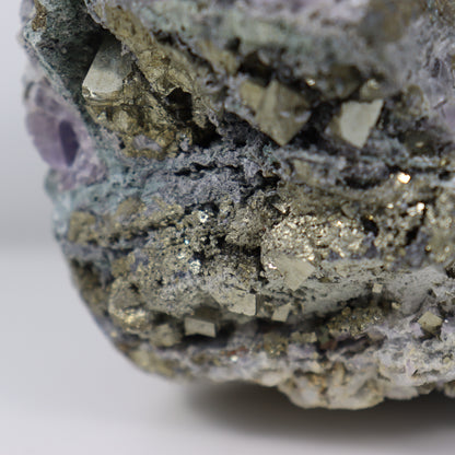 Pyrite Specimen with Clear Quartz and Amethyst Inclusions