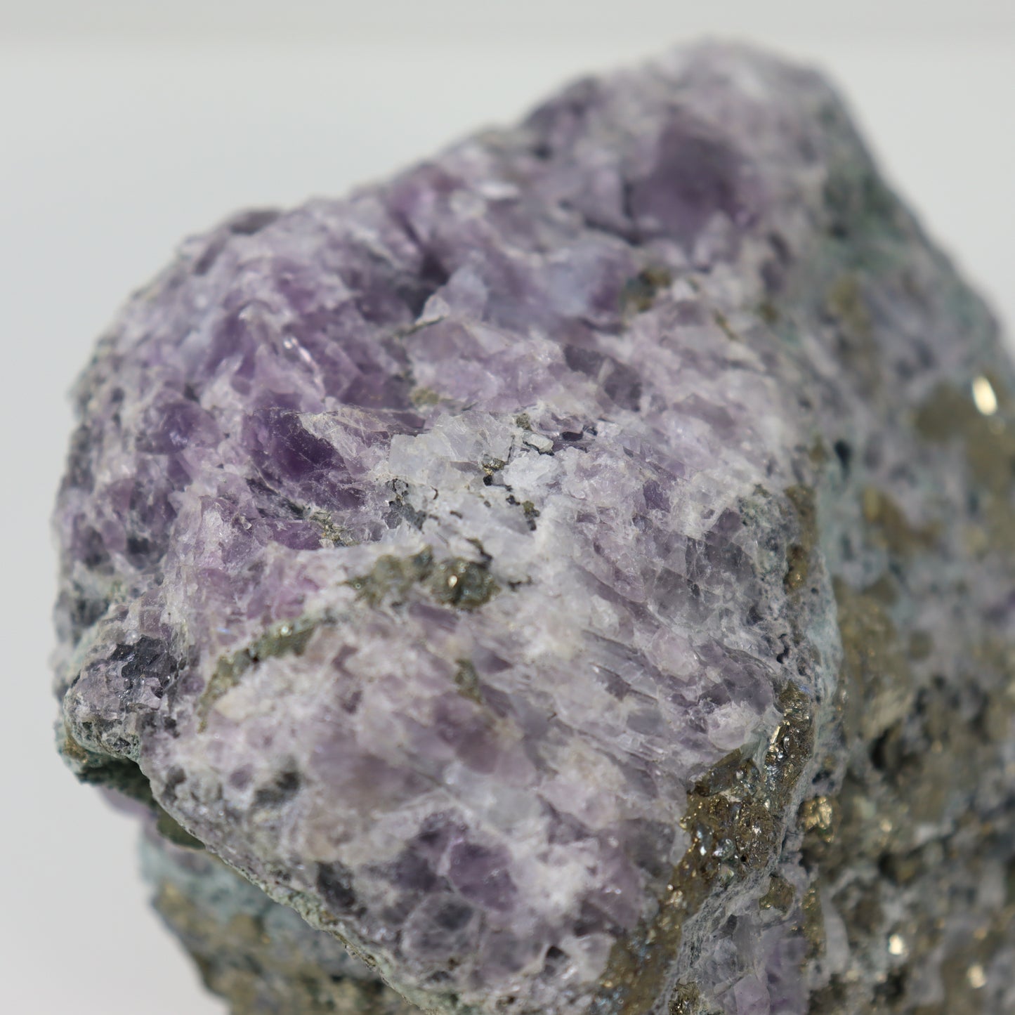 Pyrite Specimen with Clear Quartz and Amethyst Inclusions