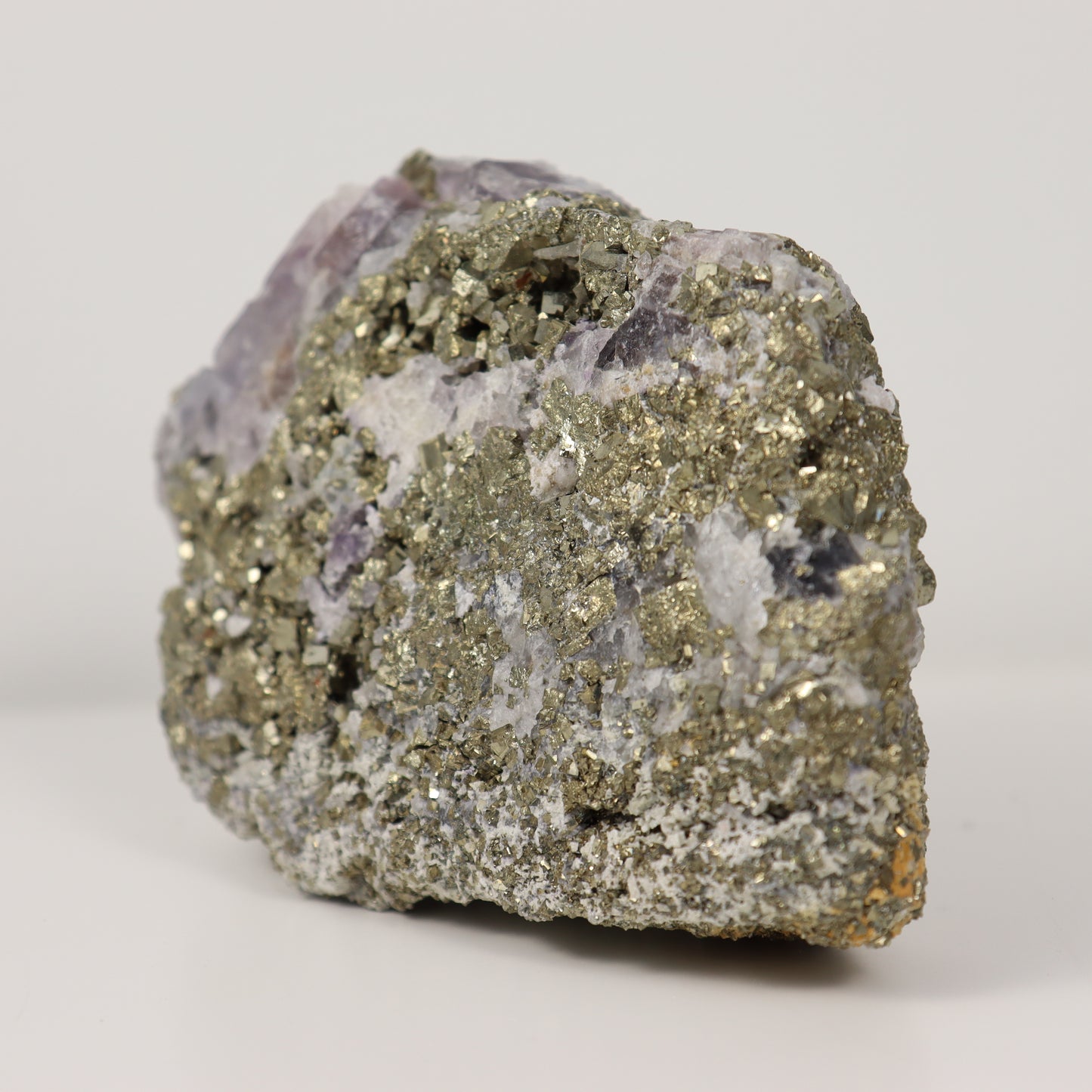 Pyrite Specimen with Clear Quartz and Amethyst Inclusions