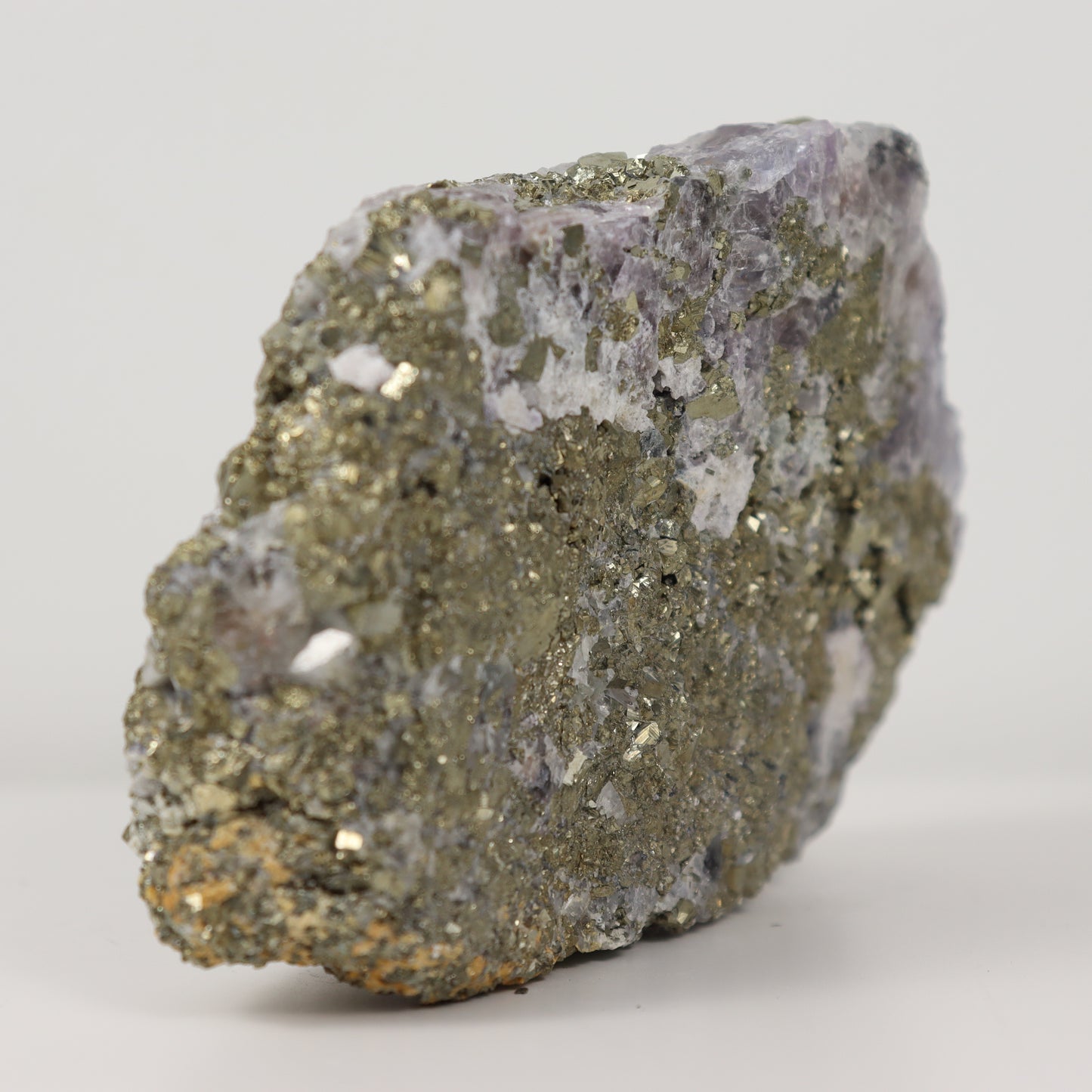 Pyrite Specimen with Clear Quartz and Amethyst Inclusions