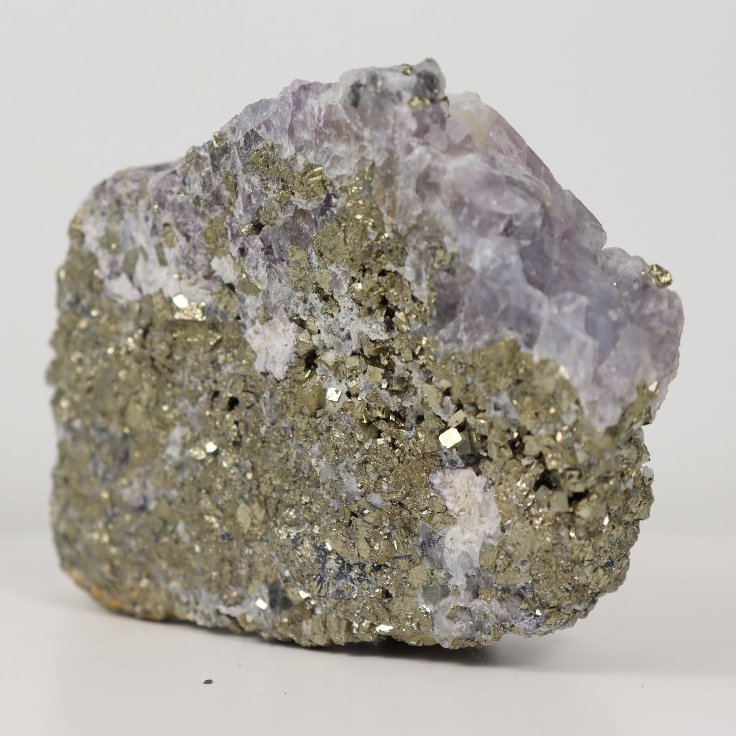 Pyrite Specimen with Clear Quartz and Amethyst Inclusions