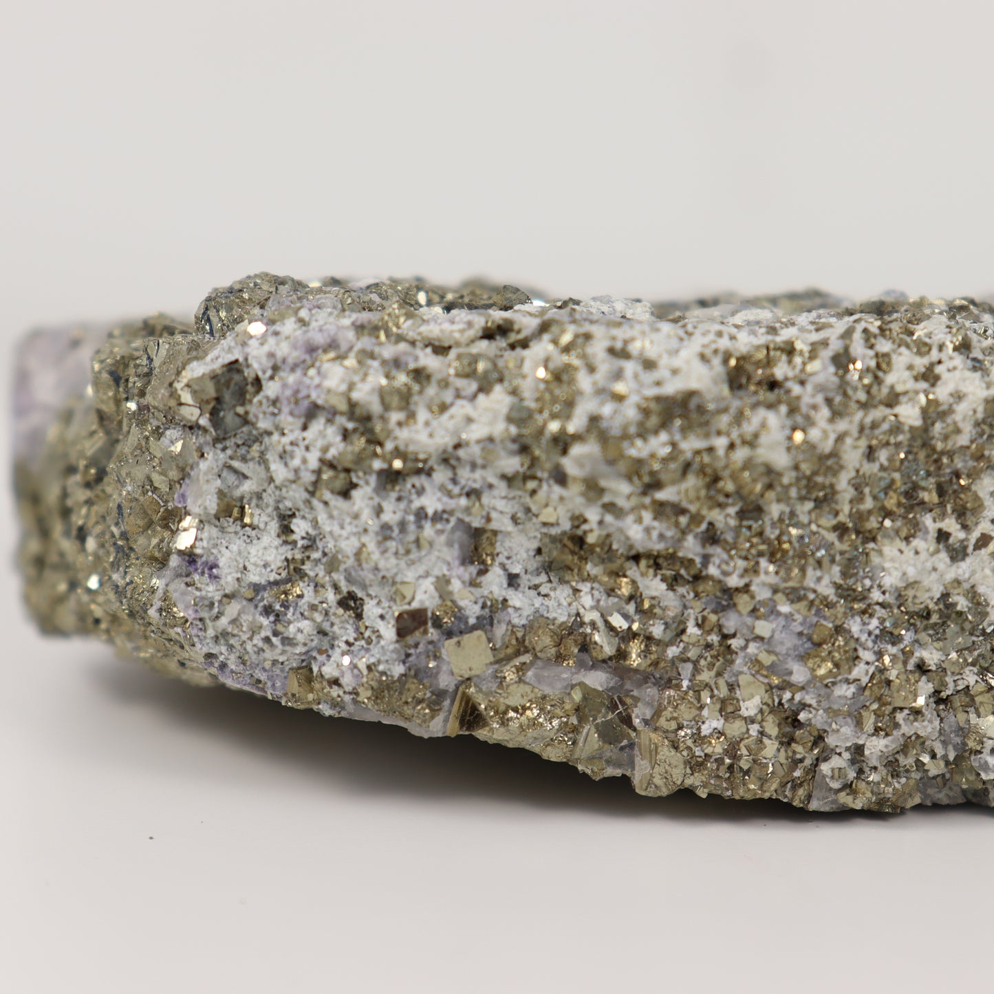 Pyrite Specimen with Clear Quartz and Amethyst Inclusions
