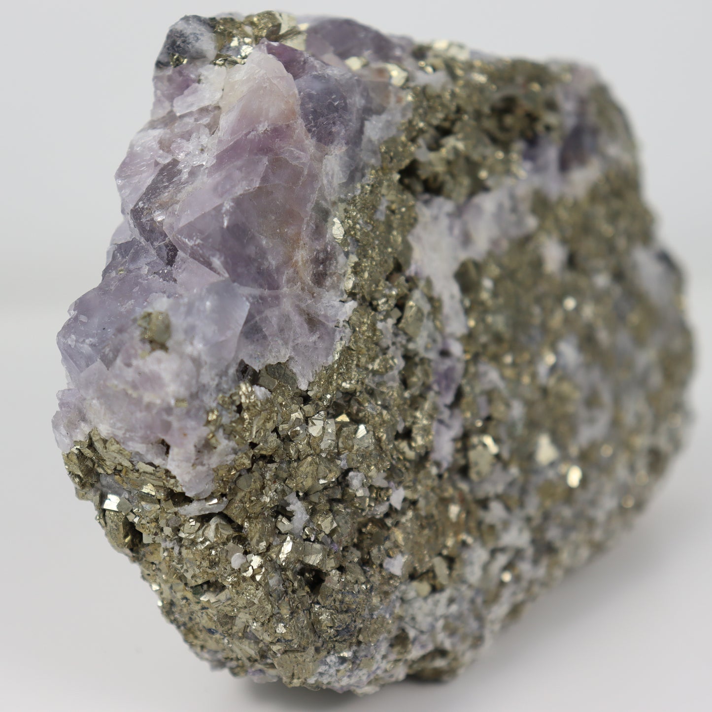 Pyrite Specimen with Clear Quartz and Amethyst Inclusions