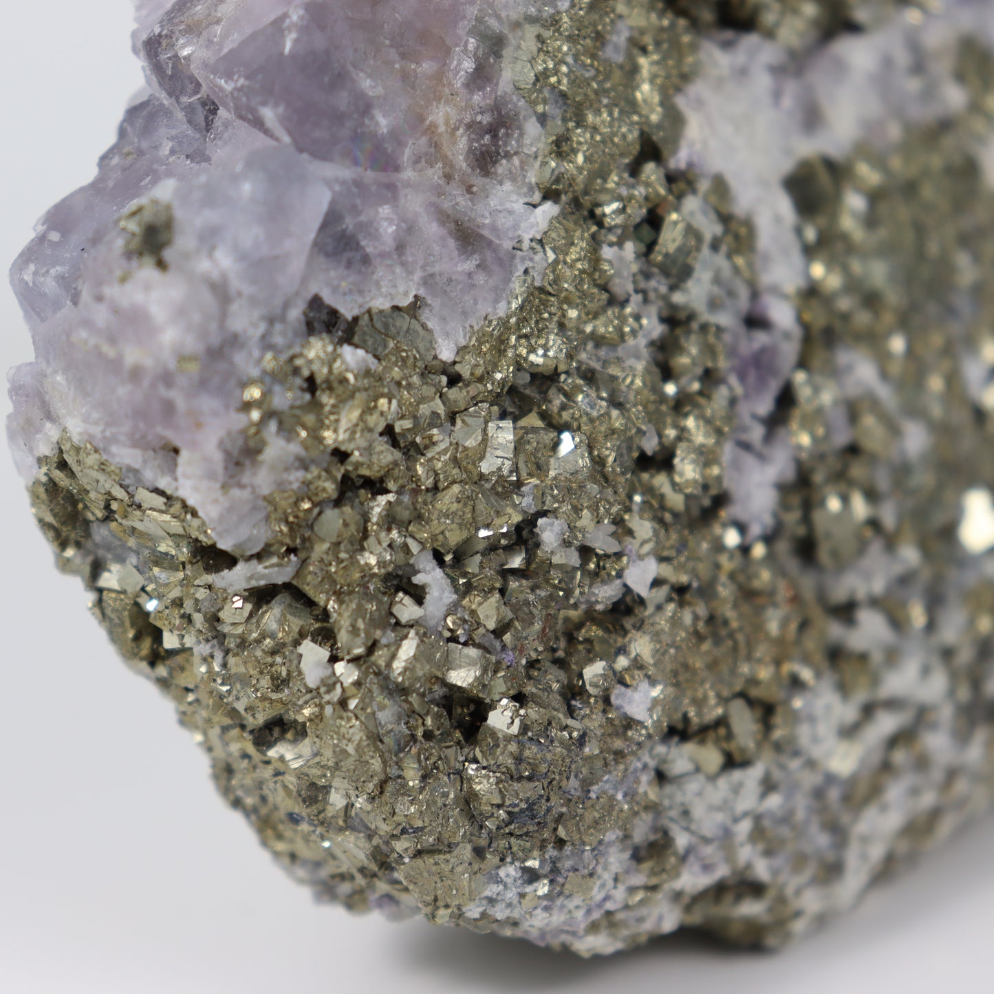 Pyrite Specimen with Clear Quartz and Amethyst Inclusions