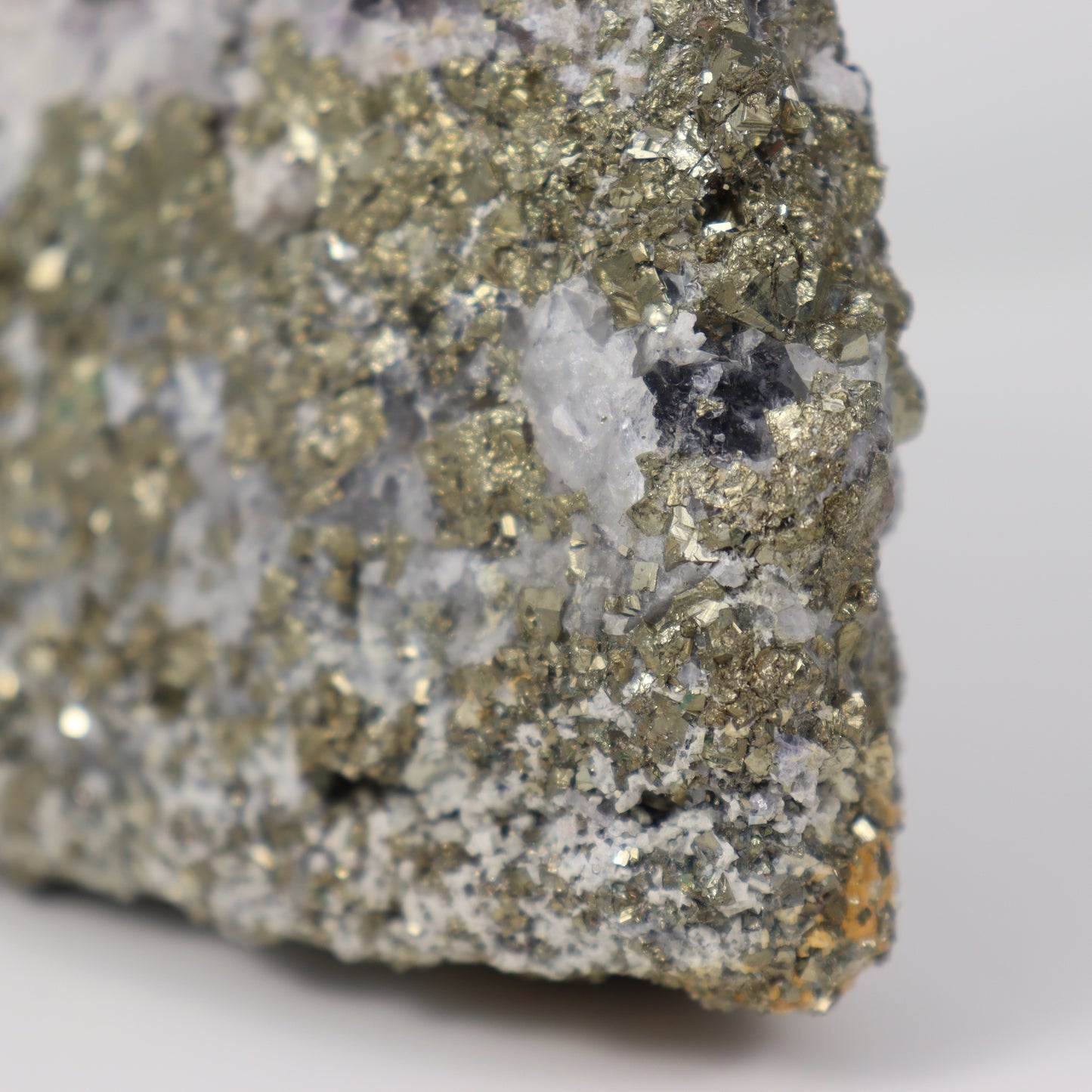 Pyrite Specimen with Clear Quartz and Amethyst Inclusions