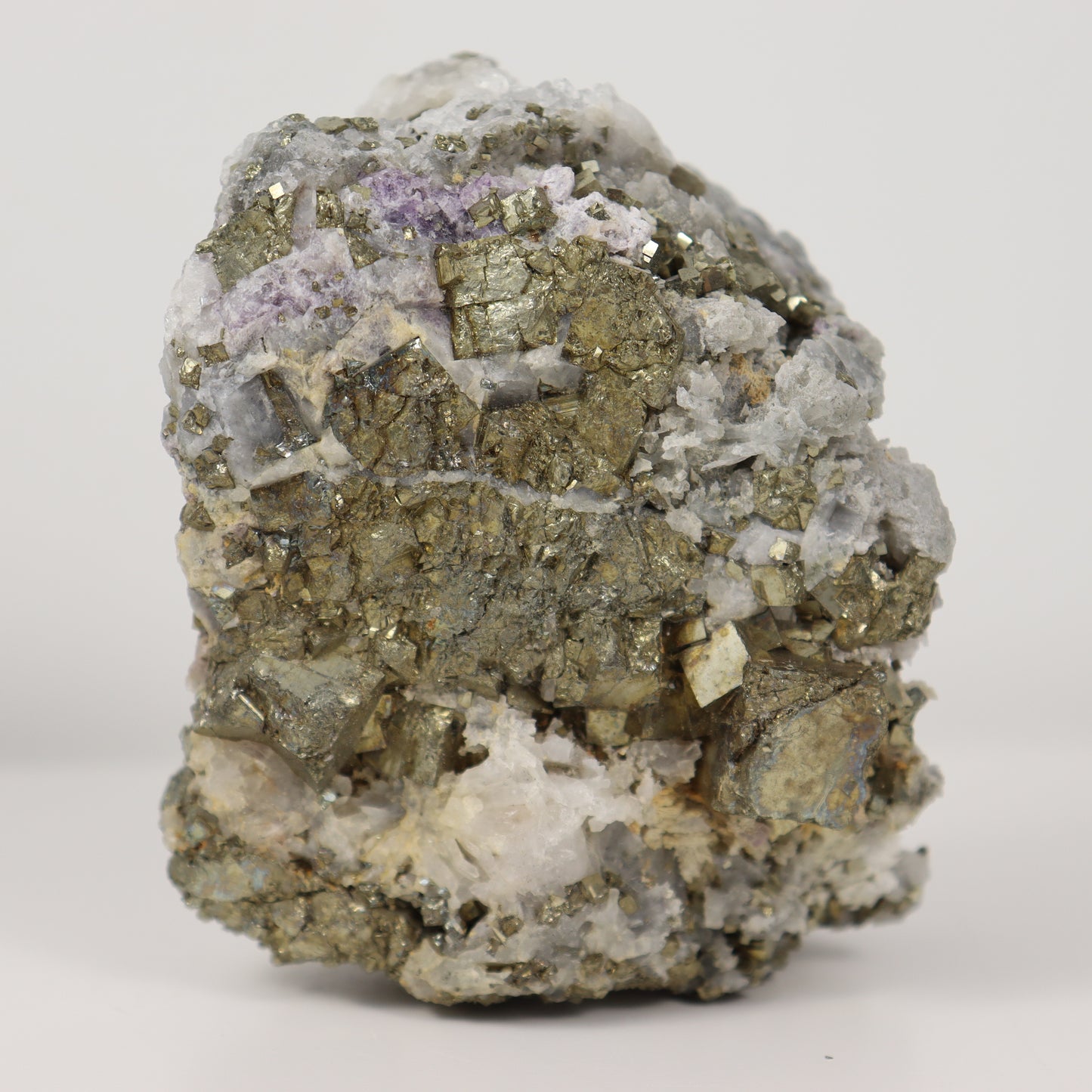 Pyrite Specimen with Clear Quartz and Amethyst Inclusions