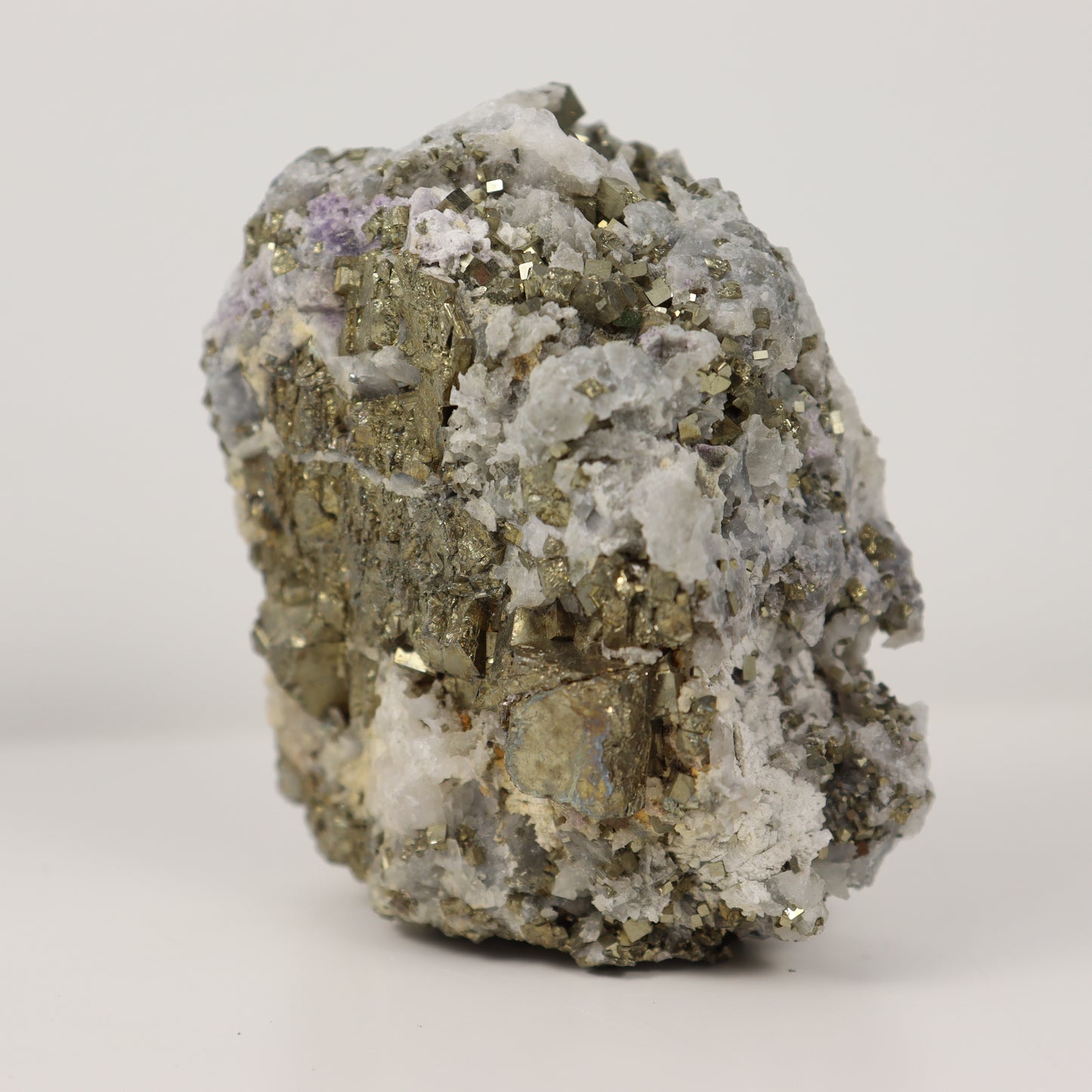 Pyrite Specimen with Clear Quartz and Amethyst Inclusions