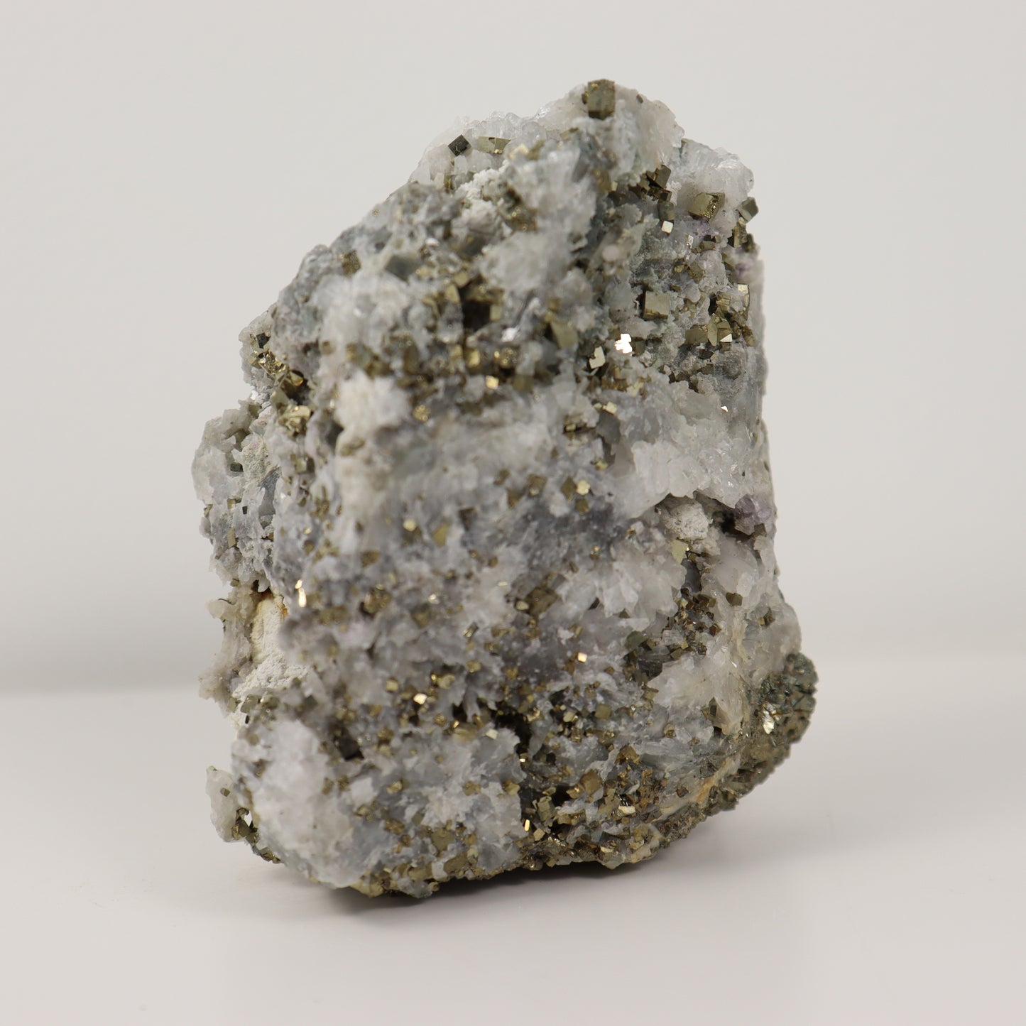 Pyrite Specimen with Clear Quartz and Amethyst Inclusions