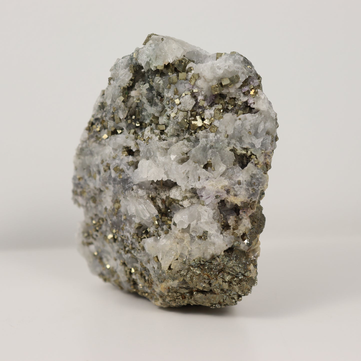 Pyrite Specimen with Clear Quartz and Amethyst Inclusions