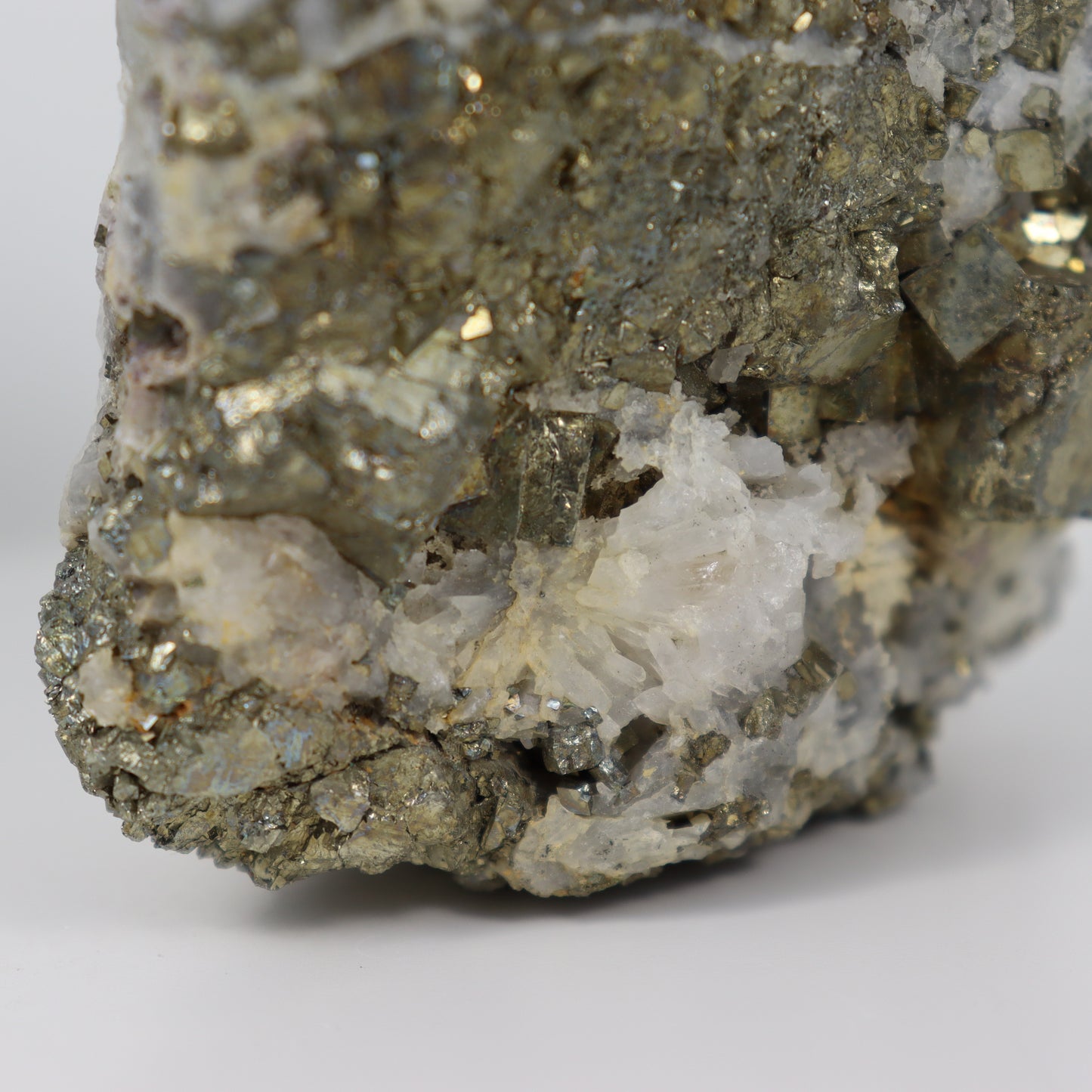 Pyrite Specimen with Clear Quartz and Amethyst Inclusions