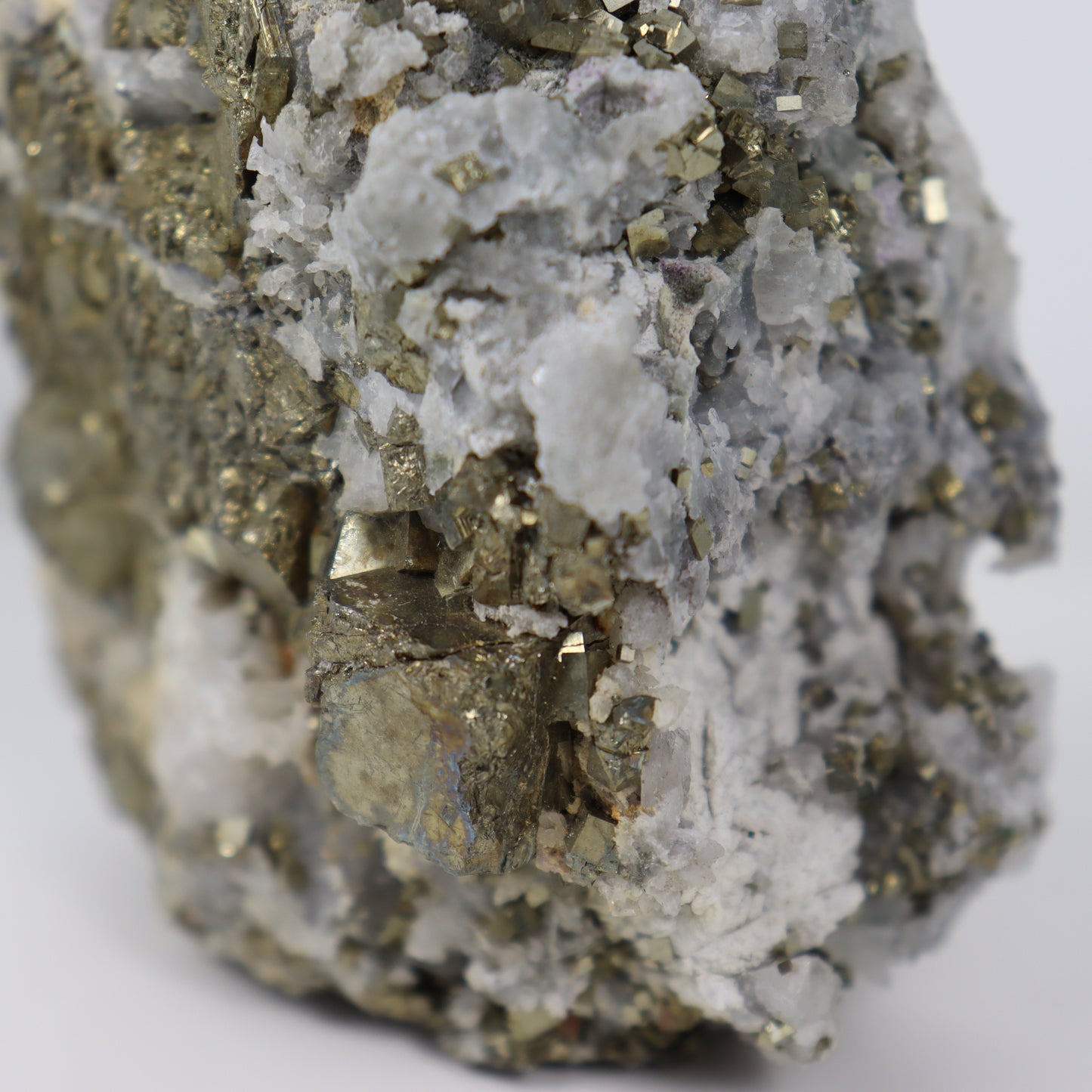 Pyrite Specimen with Clear Quartz and Amethyst Inclusions