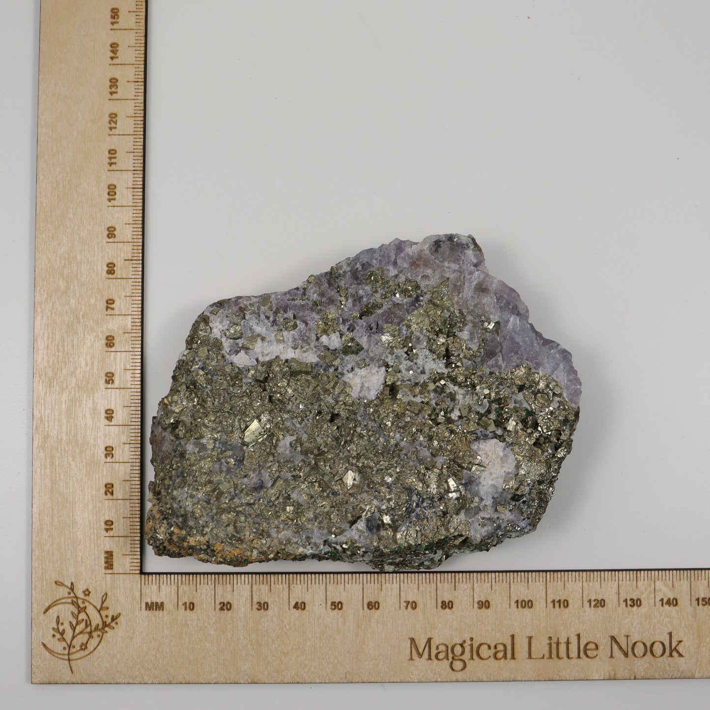 Pyrite Specimen with Clear Quartz and Amethyst Inclusions