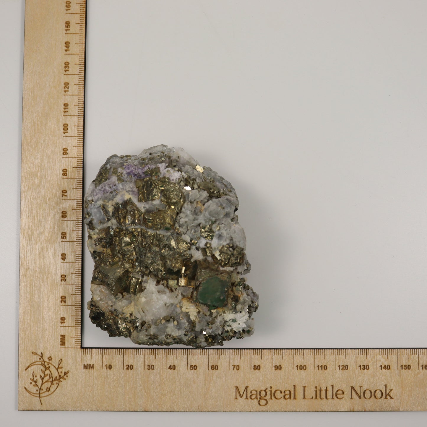 Pyrite Specimen with Clear Quartz and Amethyst Inclusions