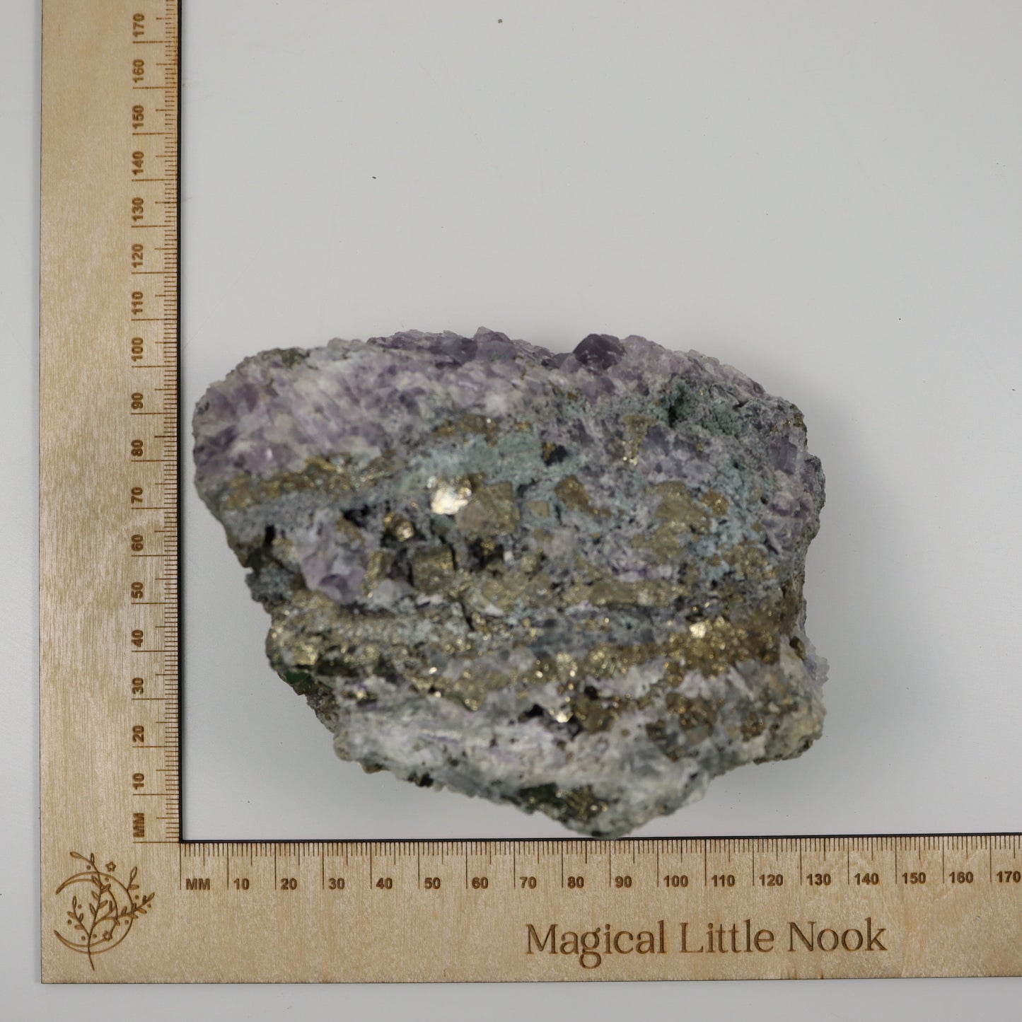 Pyrite Specimen with Clear Quartz and Amethyst Inclusions